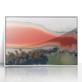 Framed abstract landscape artwork in a white frame, showcasing vibrant colors and sweeping curves, perfect for modern home decor or office spaces.