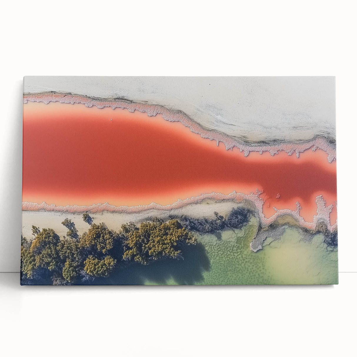 Abstract landscape canvas artwork depicting vibrant colors of green, blue, and gold, elegantly leaning against a neutral wall, perfect for modern home decor.