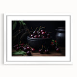 Abstract art print of vibrant fruits in a white frame, ideal for dining room decor.