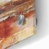 Large abstract wall art featuring swirling orange and brown hues on acrylic glass, suitable for bedroom or dining room decor.