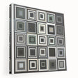 Stretched abstract geometric canvas art showcasing vibrant colors and sharp angles, perfect for modern decor, displayed from a side view. Ideal for contemporary interior design.
