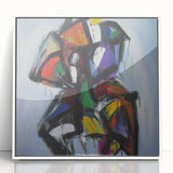 Framed acrylic wall art featuring abstract splatters in vibrant colors against a white background, ideal for modern home decor and artistic interiors.