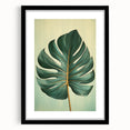 Framed wall art featuring a botanical design of vibrant flowers and green leaves, set in a sleek black frame with a white mat, perfect for modern home decor.