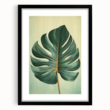 Framed wall art featuring a botanical design of vibrant flowers and green leaves, set in a sleek black frame with a white mat, perfect for modern home decor.