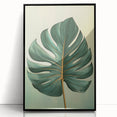 Framed wall art featuring a vibrant floral design with intricate leaves, set in a sleek black frame, perfect for adding a touch of nature-inspired decor to any room.