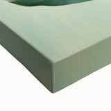 Close-up of a colorful floral and botanical wall art design printed on stretched canvas, featuring vibrant blooms and lush green leaves, perfect for home decor.