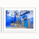 Extra large textured abstract art print depicting a Moroccan landscape in earth tones, framed with a white mat.