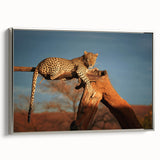 Vintage poster art of a Namibian landscape on a framed canvas, featuring a black and colorful palette.
