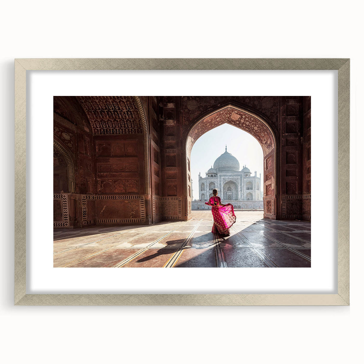 Textured abstract art print of a serene Indian landscape in soft earth tones, framed in silver, ideal for bedroom decor.