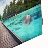 Mid-century modernist style large abstract wall art of Maldivian scenery in muted blue and green tones on acrylic glass.