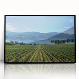 Large abstract wall art depicting the British Columbia scenery in muted earth tones, framed in black acrylic.