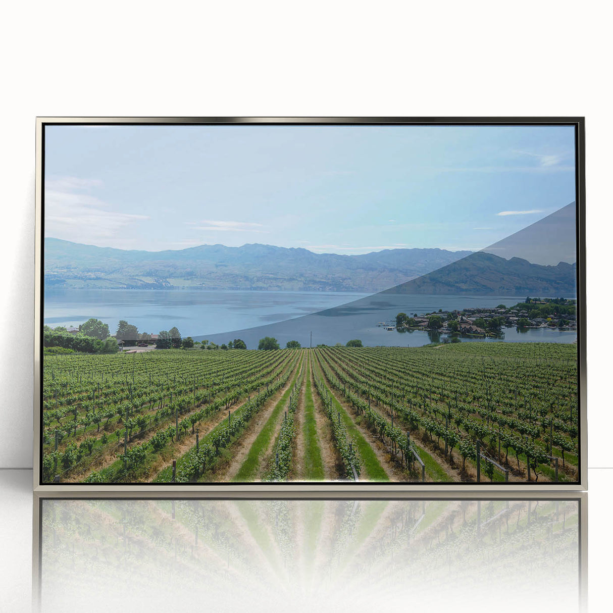 Mid-century modernist art depicting British Columbia scenery in muted earth tones on a silver-framed acrylic print.