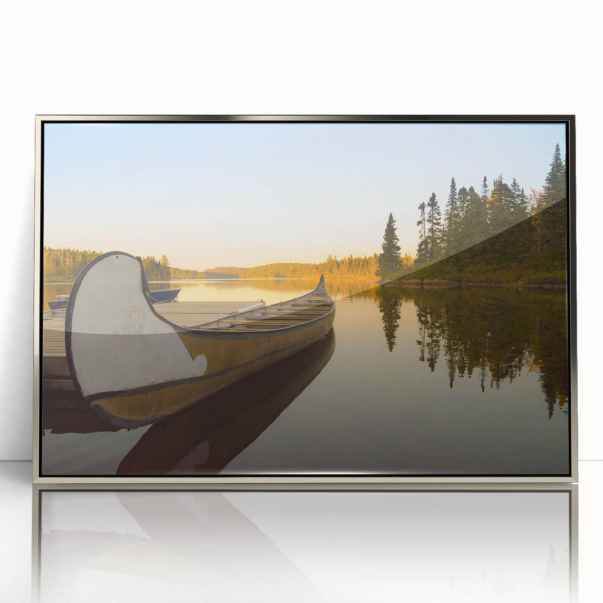 Mid-century modernist art depicting Quebec scenery in muted earth tones on a silver-framed acrylic print.