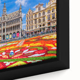Extra large framed canvas featuring a textured depiction of a European scenery in black with colorful art accents.