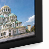 Extra large framed canvas featuring a textured, colorful European scenery in predominantly black tones.