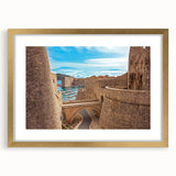 Abstract art print of a Croatian landscape in muted earth tones on a framed canvas, suitable for dining room decor.