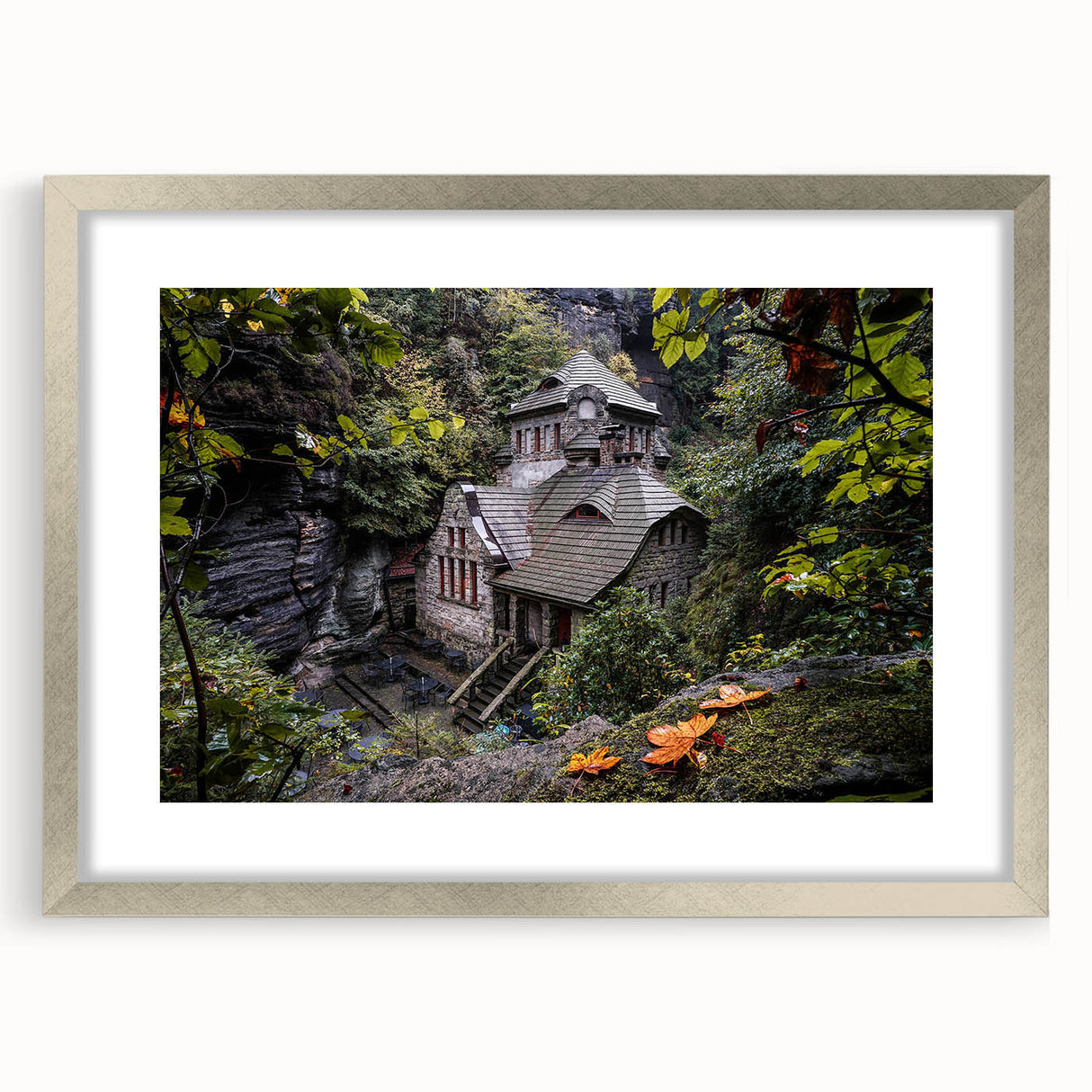 Extra large abstract art print of a textured European scenery in muted earth tones, framed in silver.
