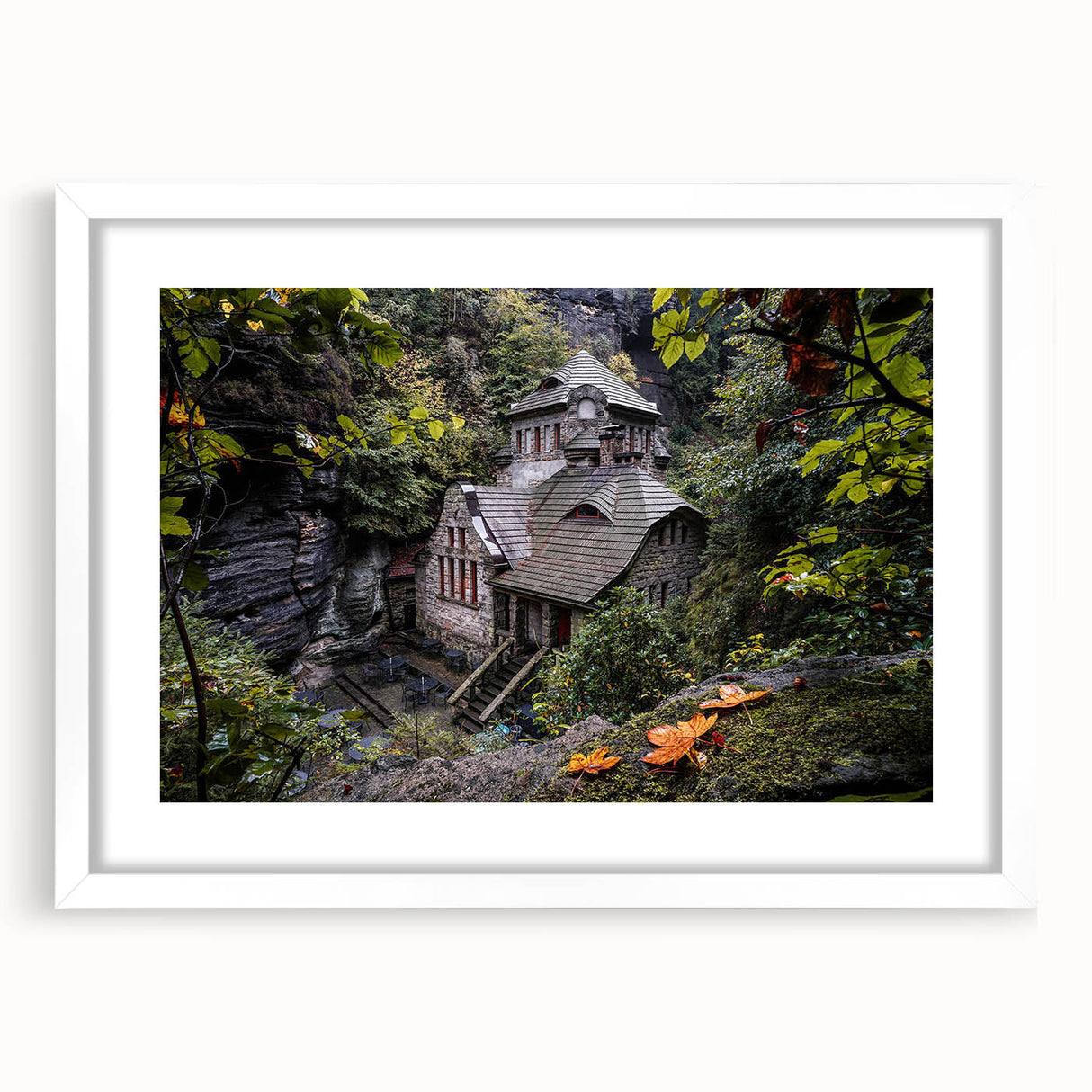Textured art print depicting an abstract European landscape in muted earth tones, framed in white, ideal for bedroom decor.