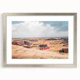 Extra large abstract art print depicting a textured European scenery in muted earth tones, framed in silver.