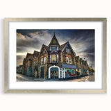 Extra large abstract art print depicting a textured scenery of Cumbria, England in muted earth tones, framed in silver.