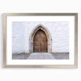 Extra large abstract art print of a European scenery in muted earth tones, framed in silver, suitable for living room decor.