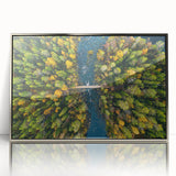 Large acrylic print of a serene Finnish landscape in muted blue and green tones, framed in silver.