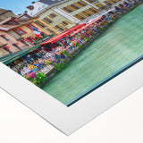 Art deco poster of the French Alps in muted earth tones on a rolled canvas, suitable for dining room decor.