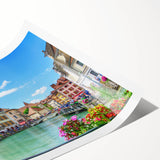 Extra large wall art featuring line art flowers with soft pastel shades on a rolled canvas.