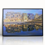 Large abstract wall art depicting a stylized Lyon cityscape in muted gray and blue tones on a framed acrylic.