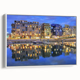 Vintage poster art of Lyon with colorful imagery on a white framed canvas, ideal for living room decor.