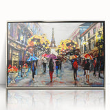 Large art print of a Parisian street scene in muted colors on a framed acrylic, suitable for modern nursery decor.