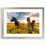 Extra large abstract art print of a textured Icelandic landscape, hues of blue and gray, in a silver frame.