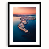 Extra large, textured abstract art print of a colorful Sicilian landscape, framed in black with a mat.