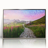 Large art print of a European cityscape in muted gray and blue tones, framed in silver acrylic.