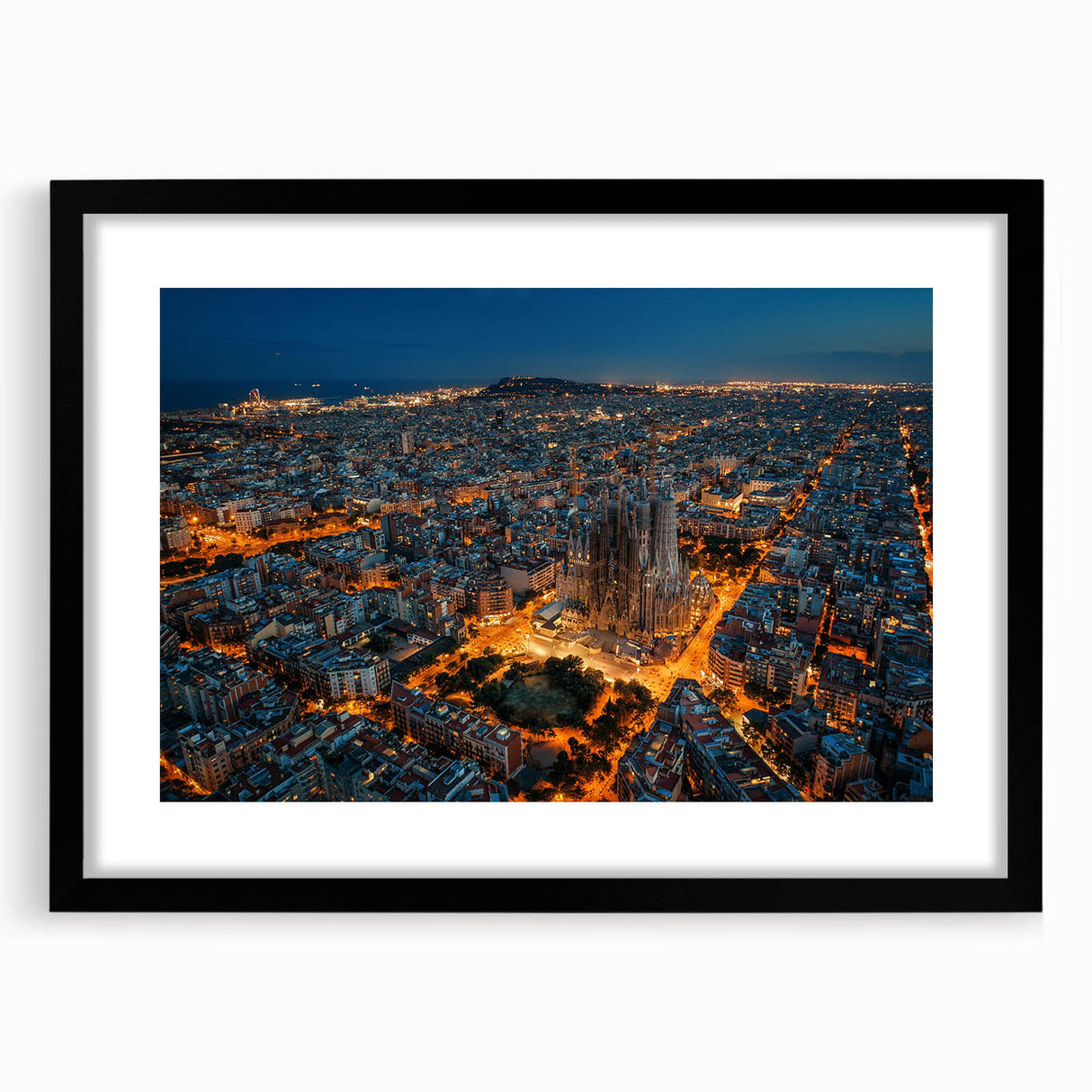 Extra large abstract art print of vibrant Barcelona scenery on textured canvas, framed in black.