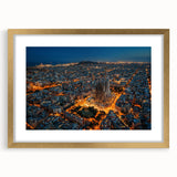 Abstract art print of Barcelona with vibrant red and orange tones on a gold-framed canvas, ideal for dining room decor.
