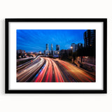 Extra large, textured abstract art print featuring vibrant, colorful depiction of Madrid scenery on a framed black canvas.