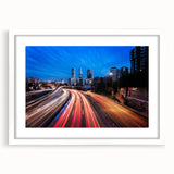 Abstract art print of Madrid cityscape in muted earth tones on a framed white mat, ideal for dining room decor.