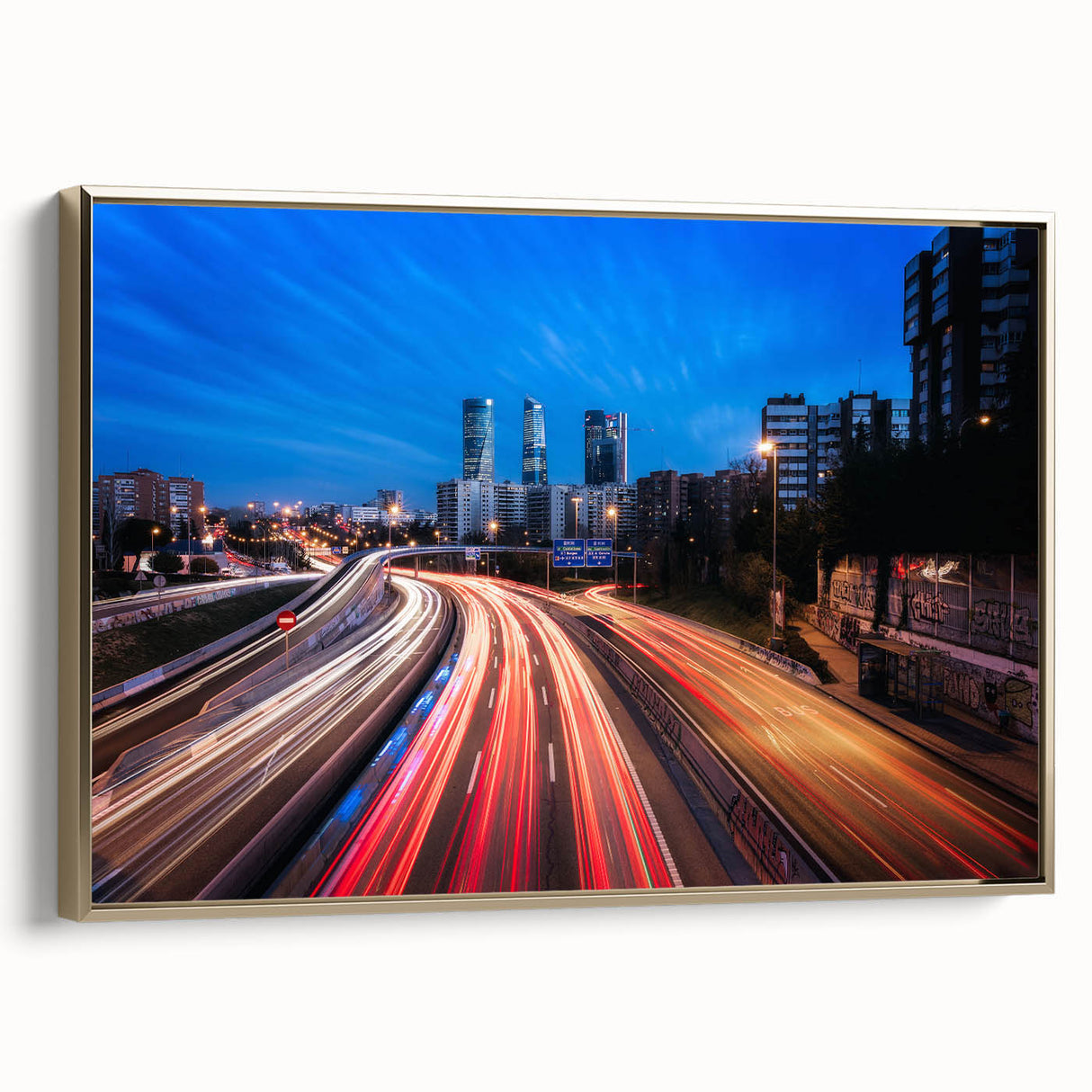 Framed canvas of a vintage-style Madrid landscape in muted gold and black tones, ideal for bedroom wall art.