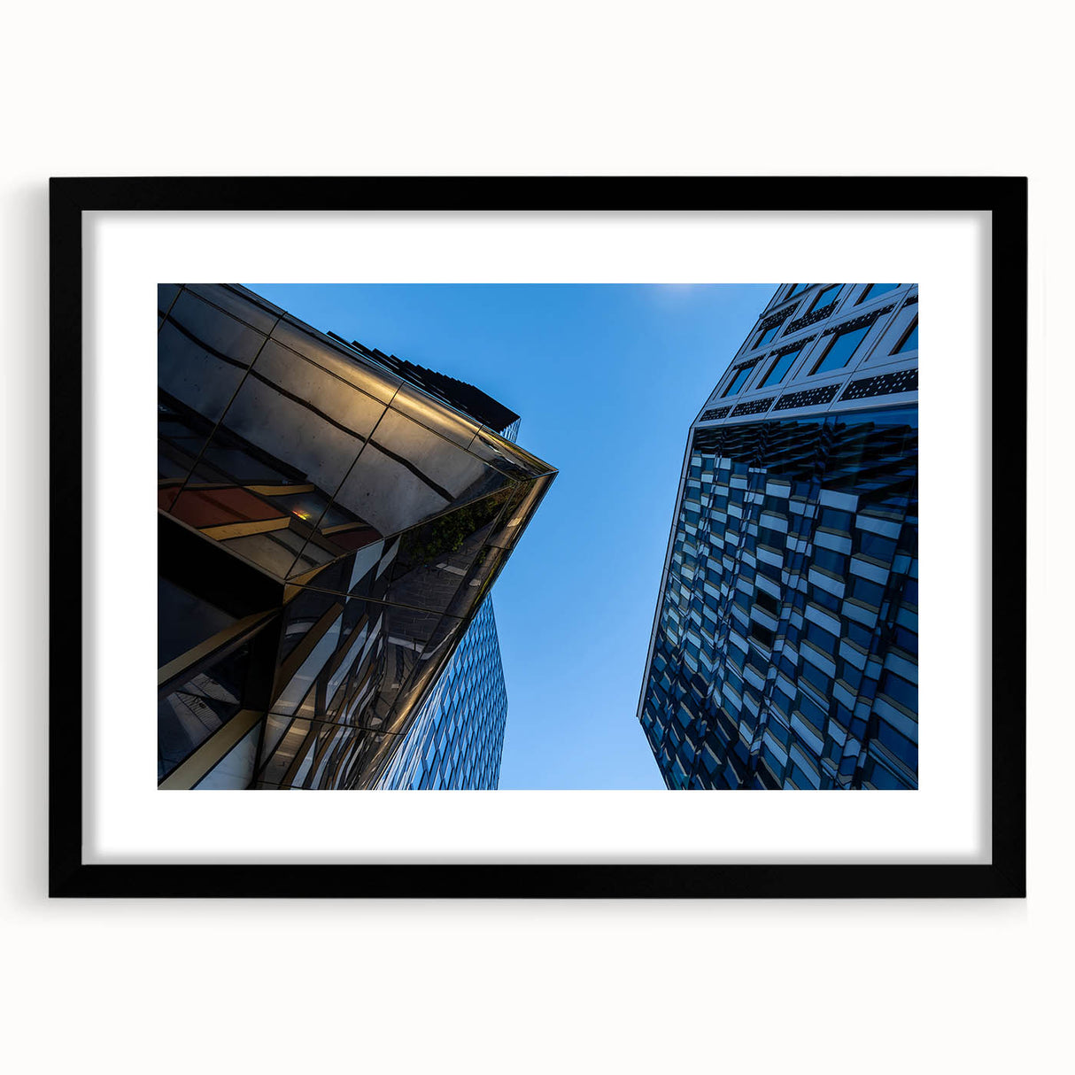 Extra large abstract art print of Stockholm, featuring textured, colorful strokes on a black framed canvas.