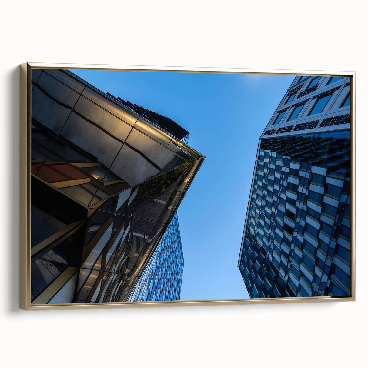 Framed canvas featuring a vintage-style landscape painting of Stockholm with a muted gold and black color scheme.