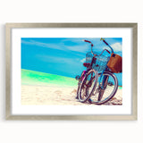 Textured abstract art print of Yucatán scenery in muted earth tones, framed in silver, suitable for bedroom decor.