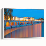 Vintage poster art of a Middle Eastern scenery in vibrant colors on a large framed canvas, ideal for living room decor.