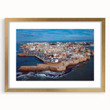 Extra large abstract art print depicting a textured Middle Eastern scenery in muted gold tones, framed with mat.