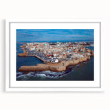 Abstract art print depicting a Middle Eastern landscape in muted earth tones on a framed white mat.