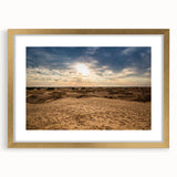 Extra large abstract art print featuring textured scenery of Oman in muted earth tones, framed in gold.