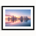 Extra large abstract art print featuring colorful, textured scenery of Qatar, in a black frame with mat.