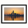 Extra large abstract art print depicting colorful, textured scenery of Abu Dhabi, framed in black.