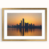 Extra large abstract art print of Abu Dhabi scenery in muted earth tones on a textured canvas, framed in gold.