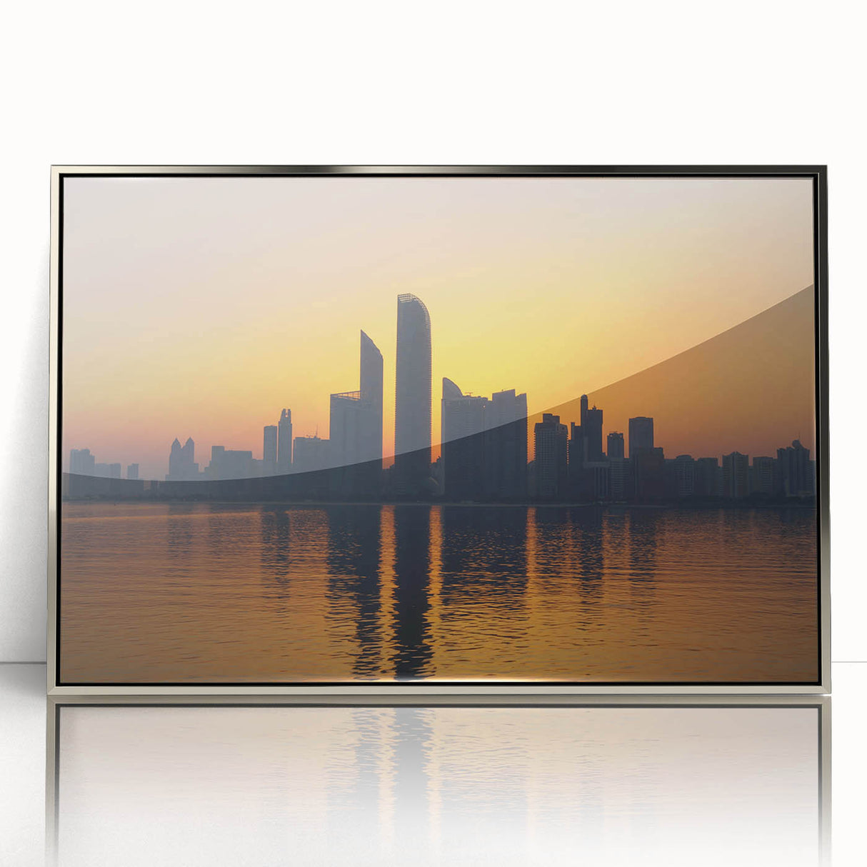 Mid-century modernist art of Abu Dhabi skyline in silver framed acrylic, featuring cool blue and gray tones.
